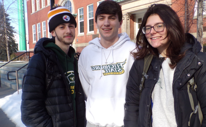 Two male and one female student in front of Edgerly Hall